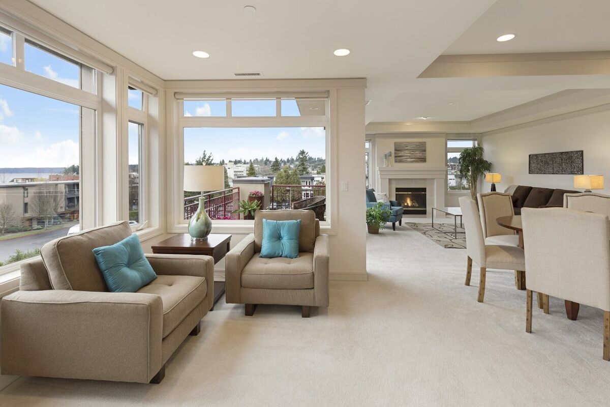 Clear floor space and good circulation make rooms read larger — in photographs and in person.